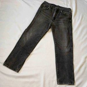 Men's 33x32 Wrangler retro acid wash black jeans.